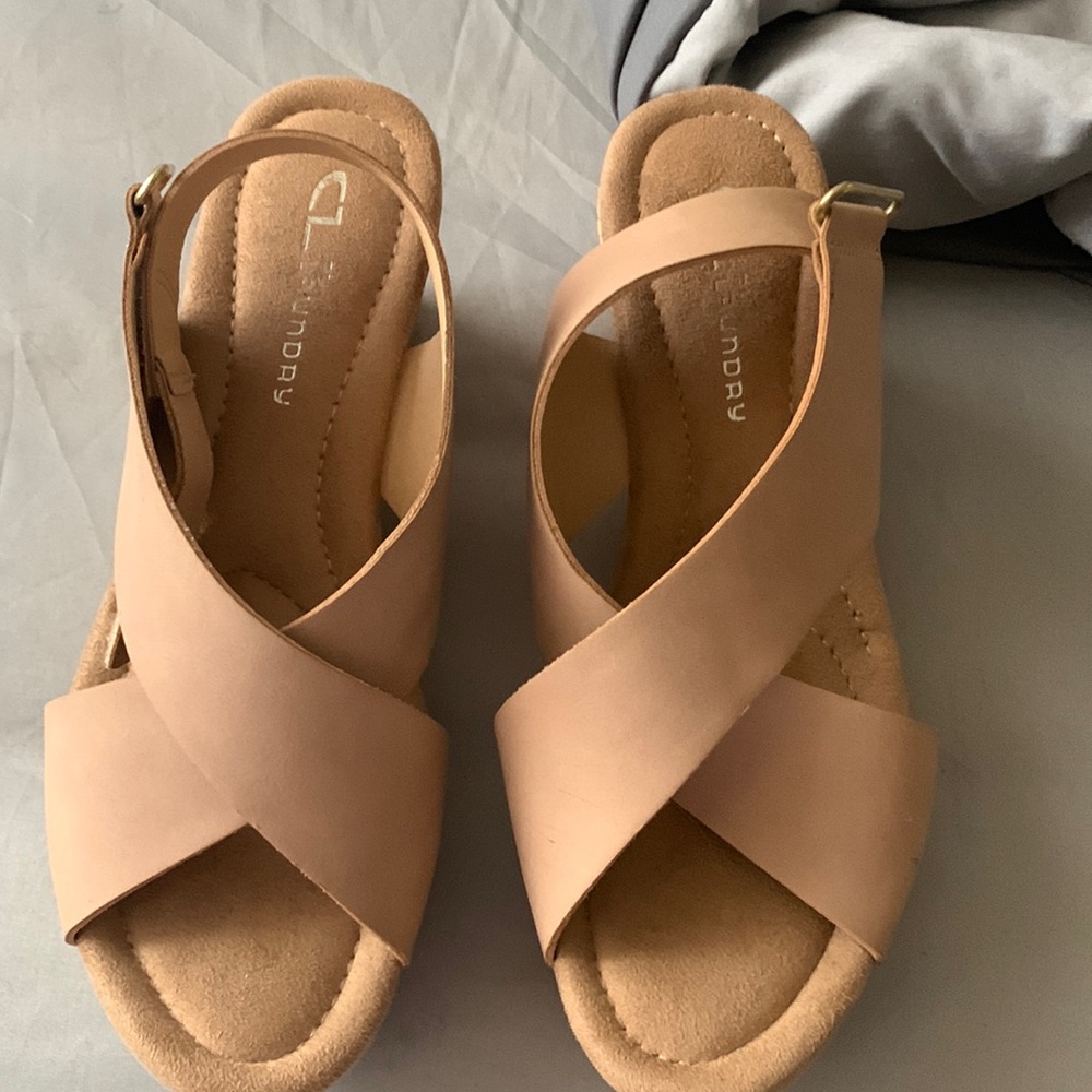 Brand new tried on a few times by my daughter to see if she could walk in them